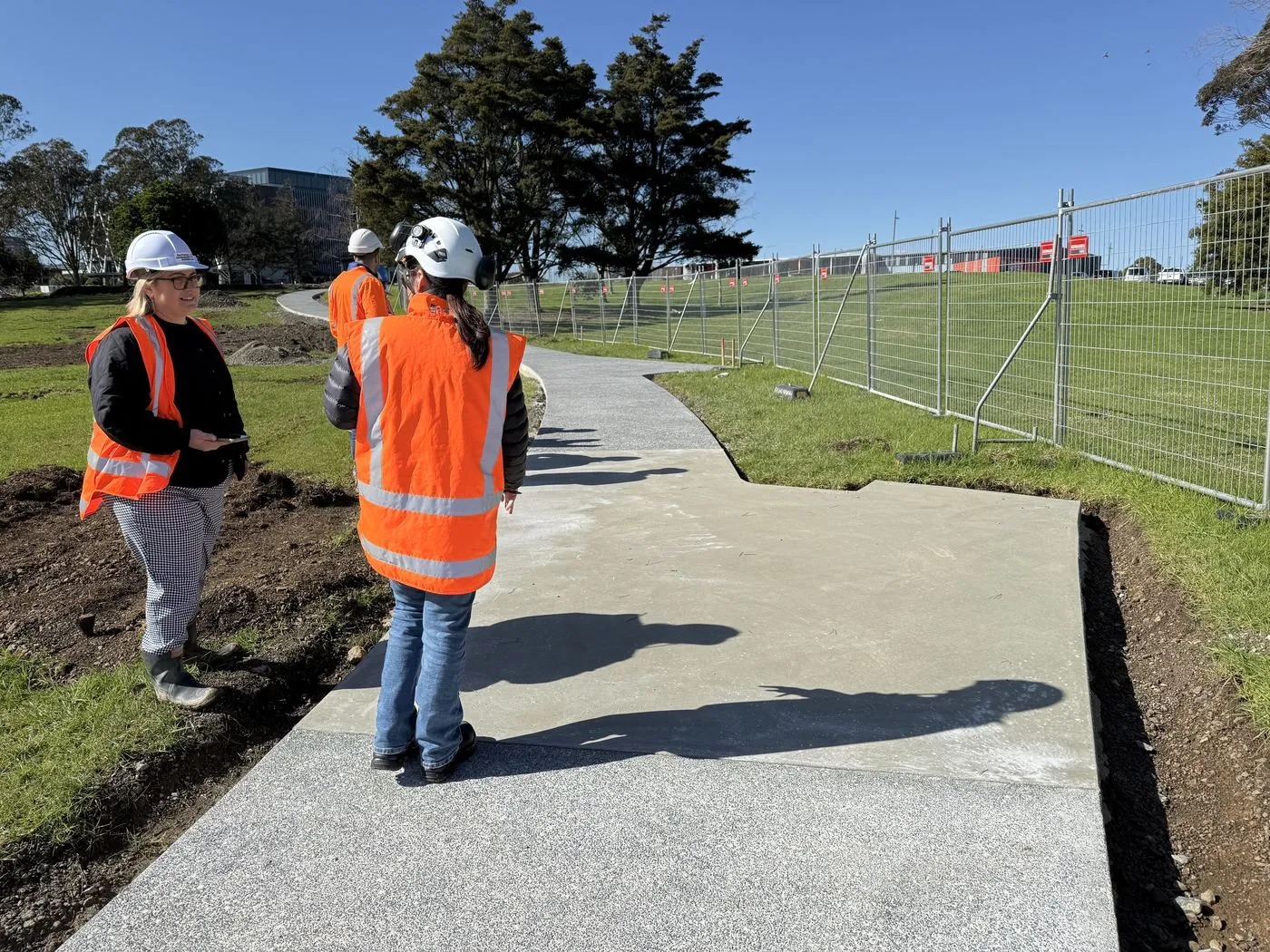 Urban Solutions engineers walking the first new path at Hayman Park