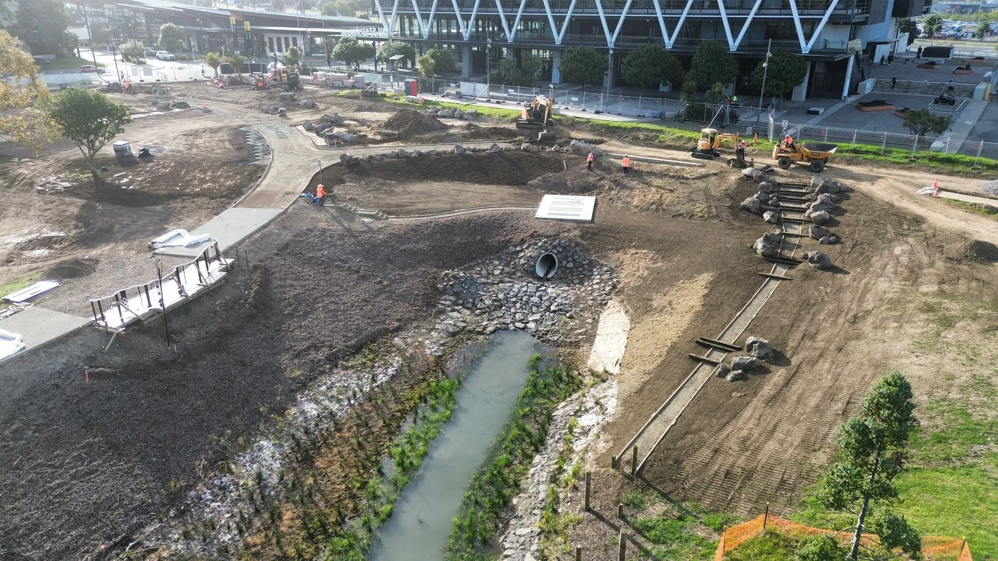 Aerial view of the outlet and planted channel beside the MIT building
